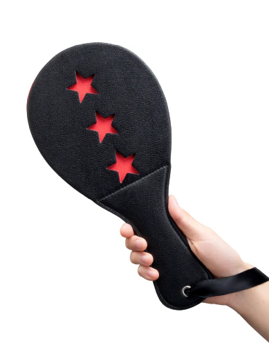 star-patterned spanking paddle